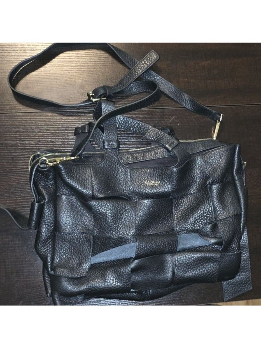 Lia Numa Black Leather Handbag.